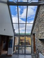 Case Study: Glass Roof Atrium Linking 300-Year-Old Barns